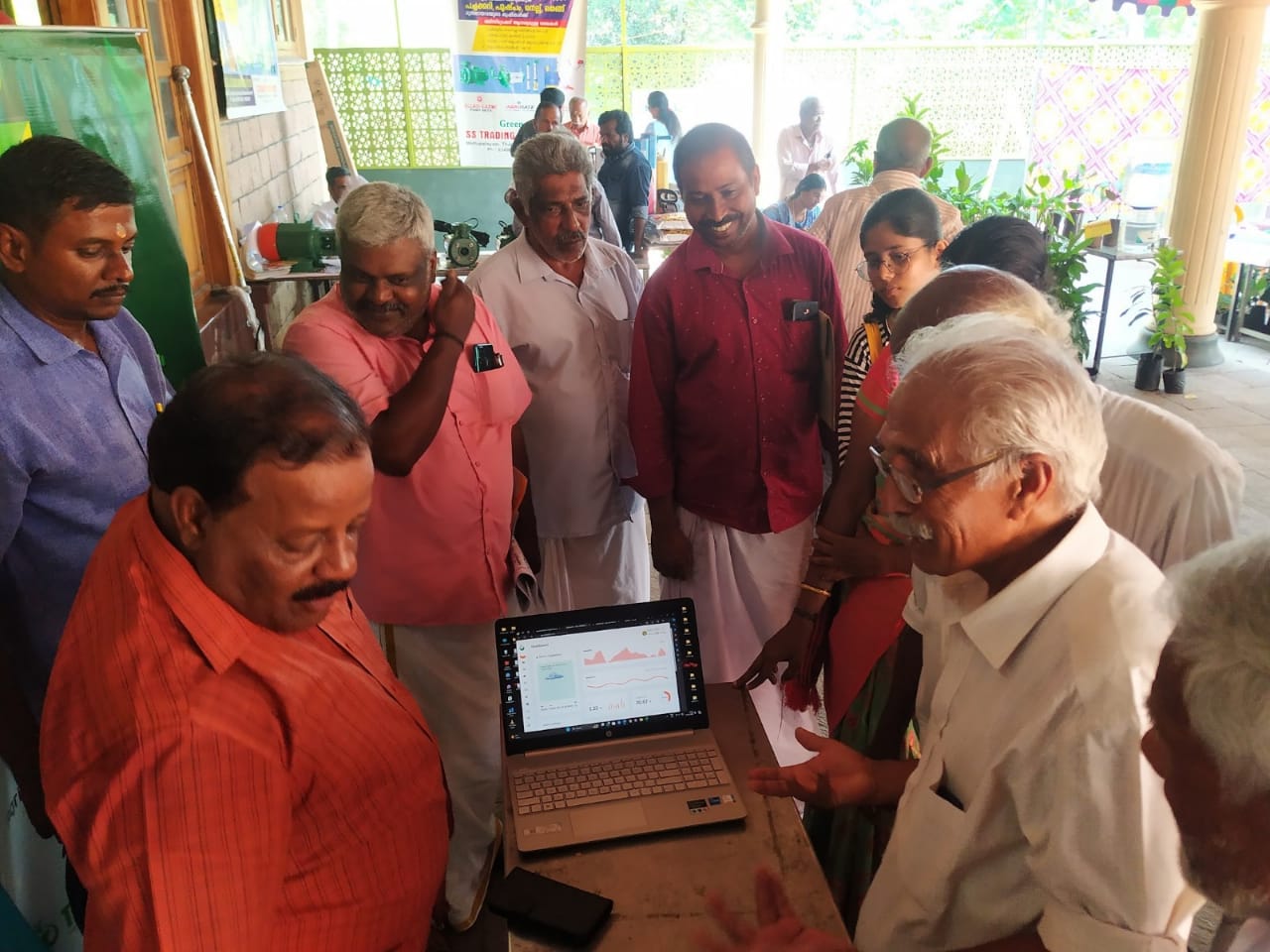 demonstration of our soil testing equipment in Seneluto, explaining agricultural scientist to farmers